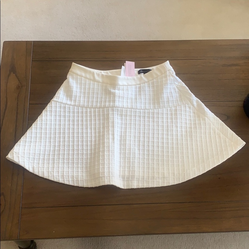 White flared textured mini skirt